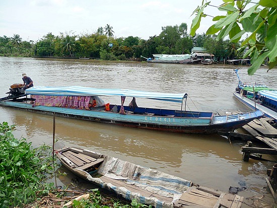 1.1288740217.our-longtail-boat-on-the-mekong-delta